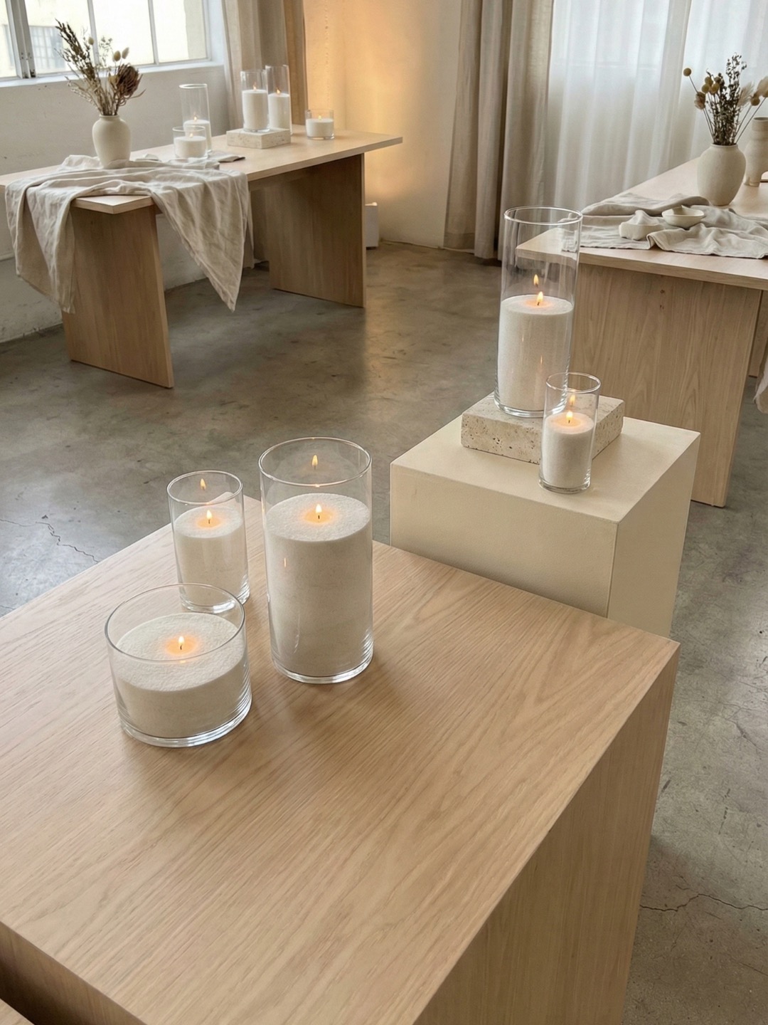 Candlelit wedding table styling with mixed vessel heights