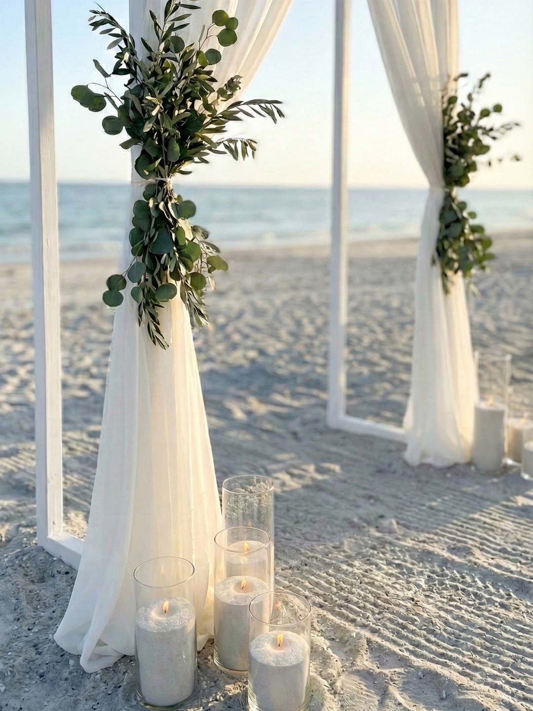 Clustered wedding candles for a styled event table