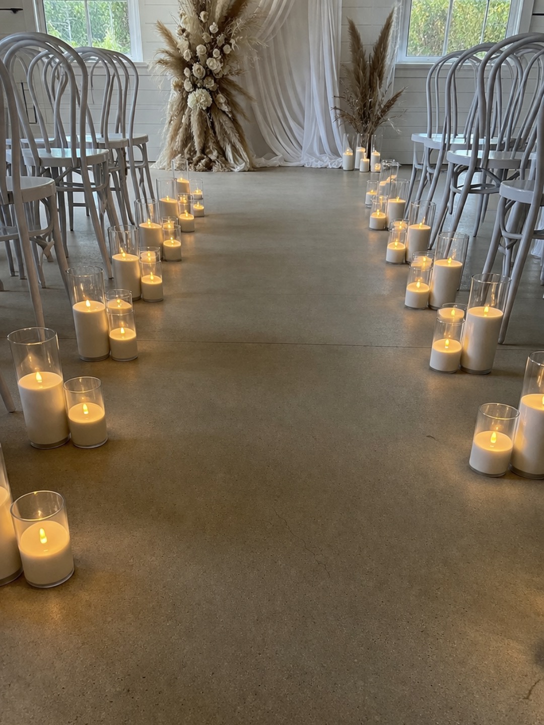 Warm evening candle styling for a wedding reception